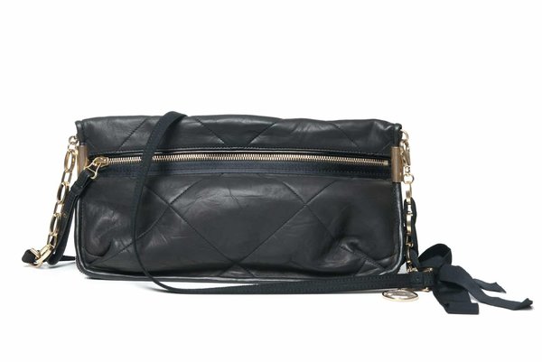 What is the correct procedure for checking and adjusting the clutch pedal free play in a manual transmission car?